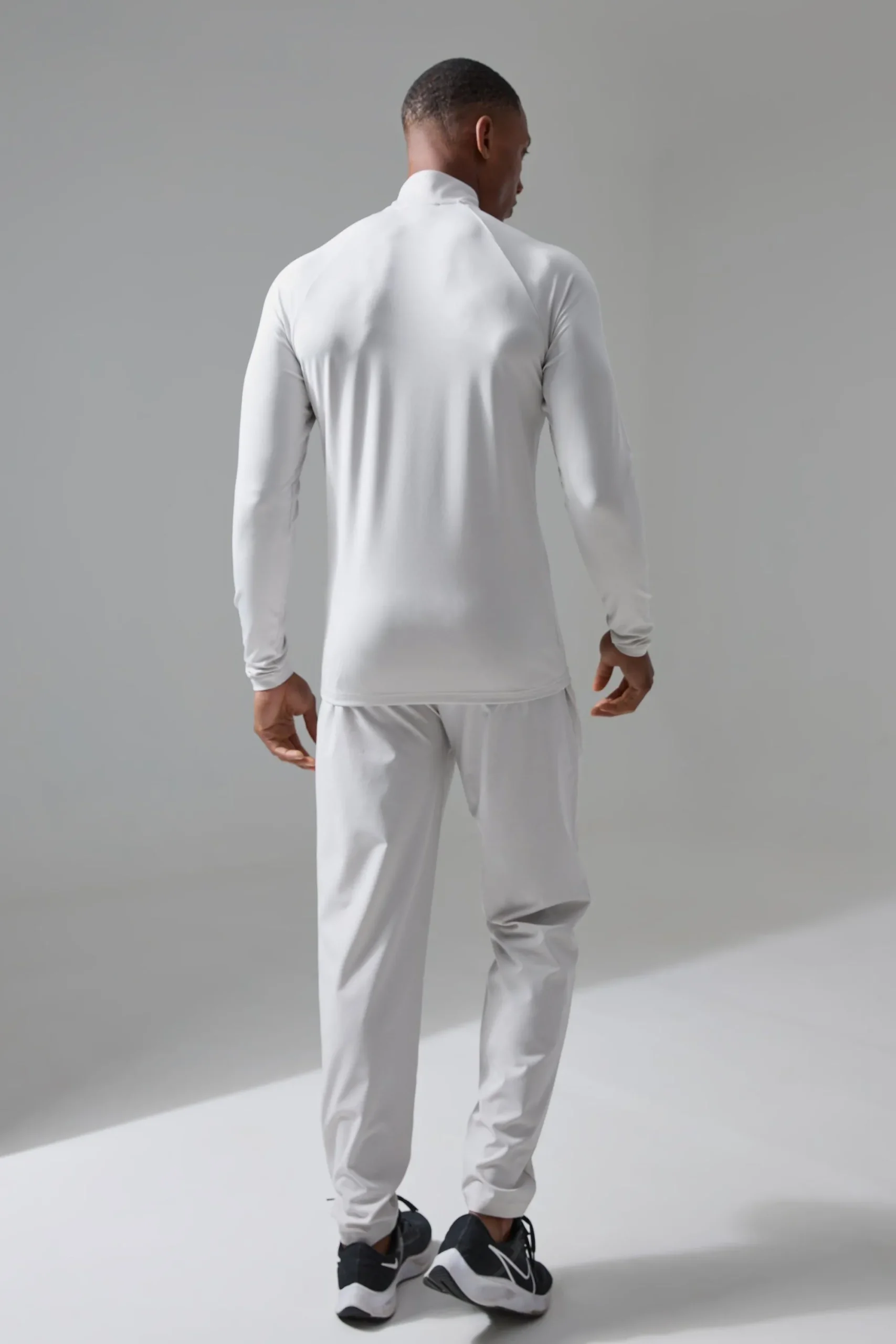 boohooMAN Active Training Dept Perforated Slim Fit 1/4 Zip Top | UK| Hoodies & Sweatshirts