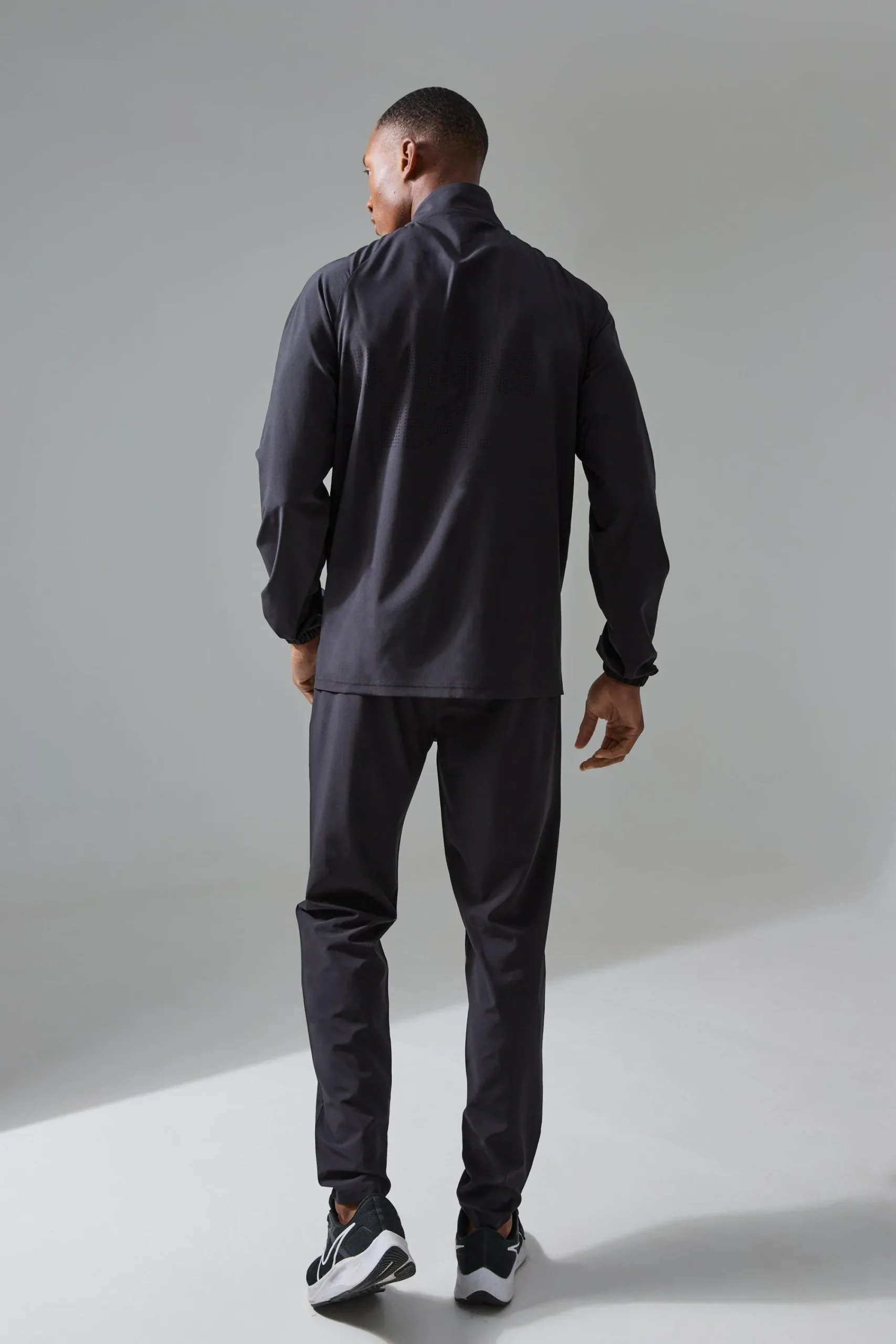 boohooMAN Active Training Dept Slim Woven Perforated Jogger | UK| Joggers