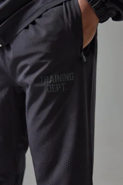 boohooMAN Active Training Dept Slim Woven Perforated Jogger | UK| Joggers
