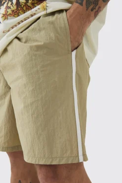 boohooMAN Elasticated Waist Side Piping Shell Shorts In | UK| Shorts