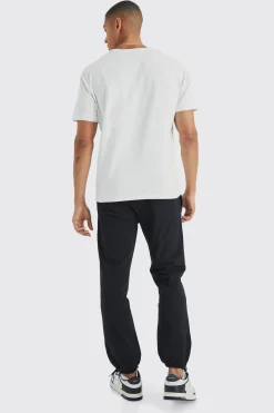 boohooMAN Elasticated Waist Slim Fit Technical Stretch Jogger | UK| Trousers