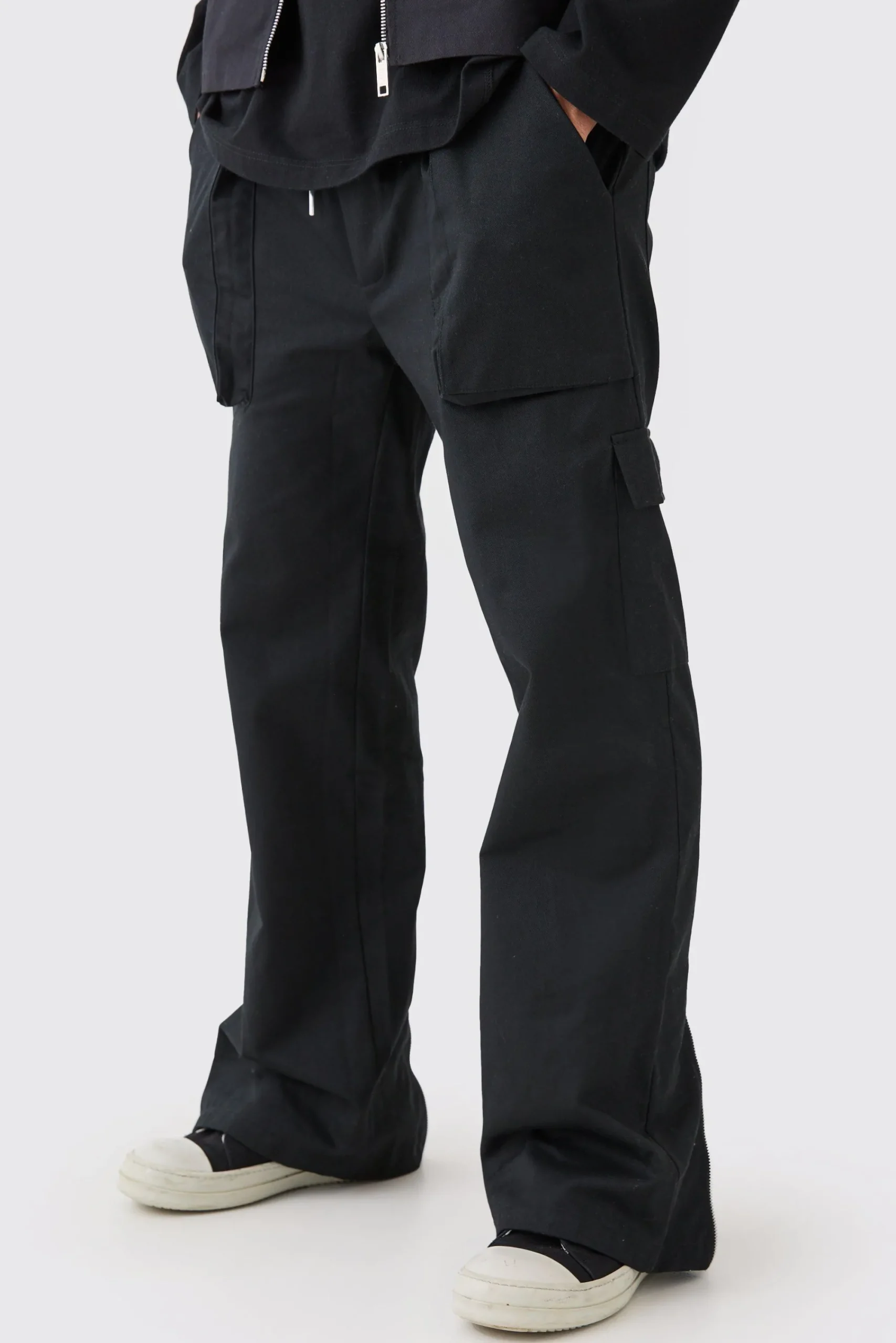 boohooMAN Elasticated Waist Zip Hem Flared Cargo Trousers | UK| Trousers|Cargos