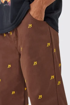 boohooMAN Fixed Waist Relaxed All Over Embroidery Trouser | UK| Trousers