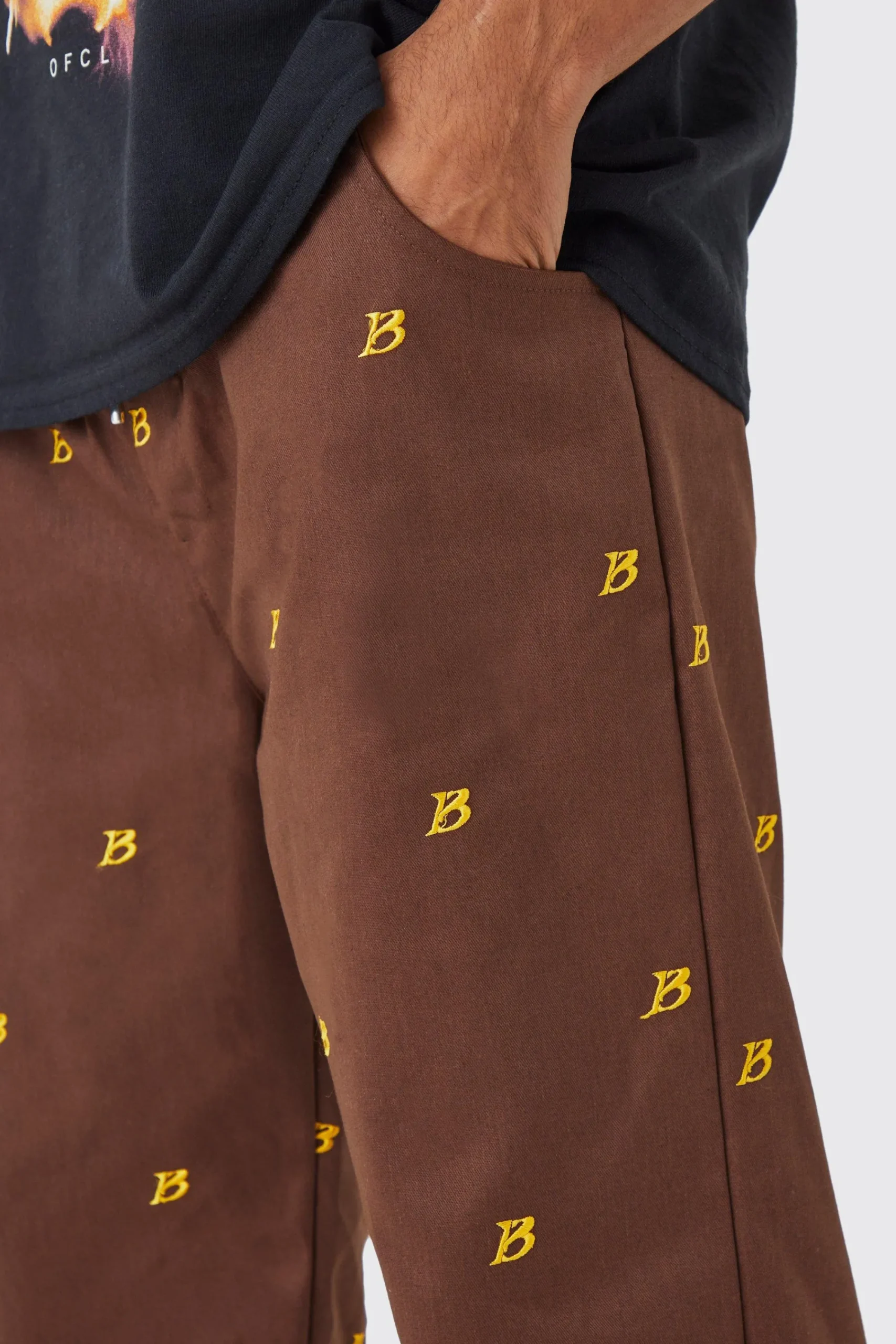 boohooMAN Fixed Waist Relaxed All Over Embroidery Trouser | UK| Trousers