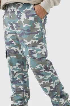 boohooMAN Fixed Waist Slim Flare Washed Camo Gusset Trouser | UK| Trousers