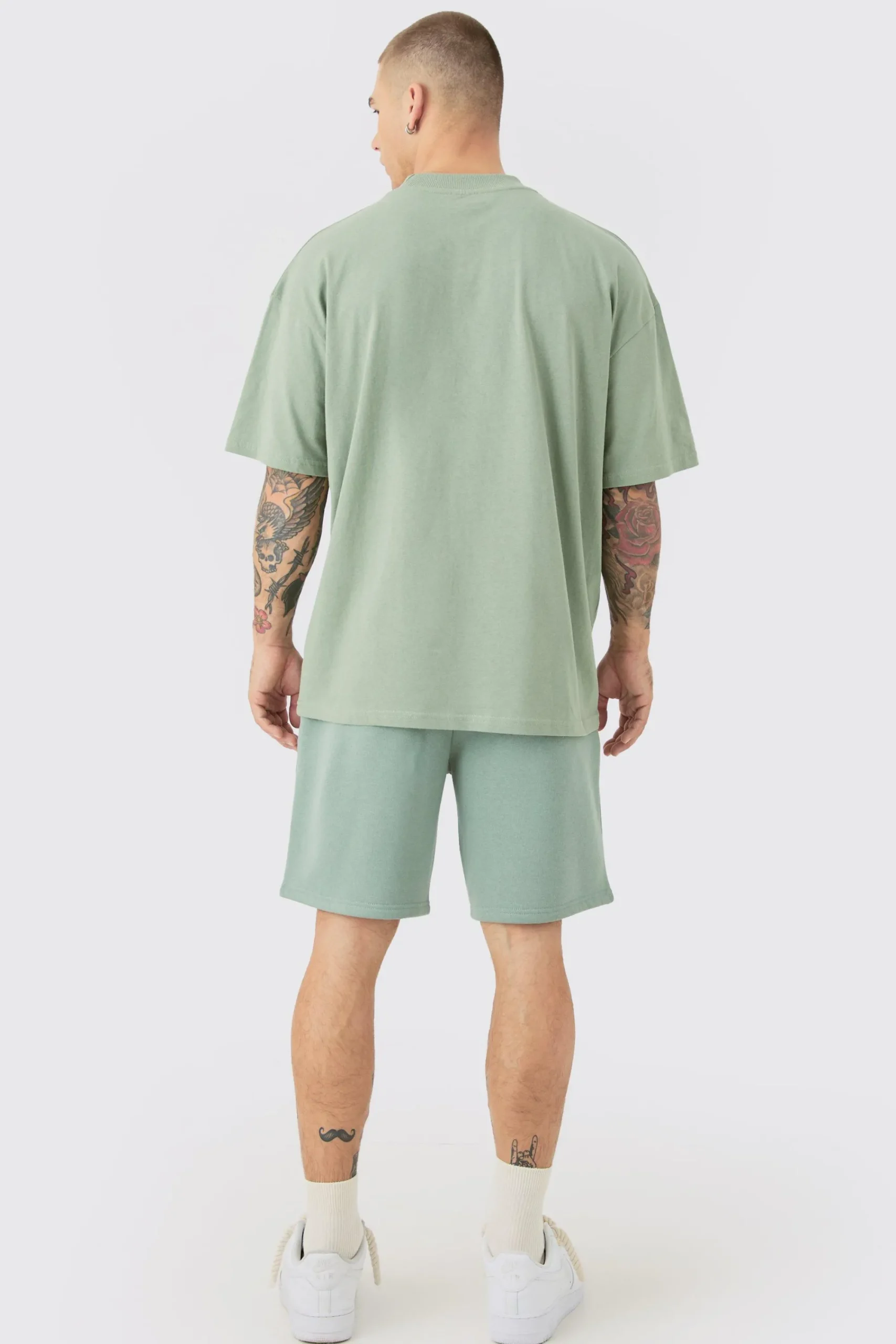 boohooMAN Oversized Extended Neck Limited Embossed T-shirt And Relaxed Short Set | UK| Sets & Co-Ords|Tracksuits