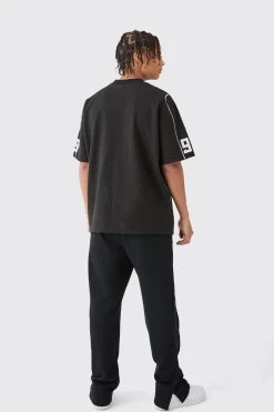 Oversized Extended Neck Universal Graphic T-shirt | UK^boohooMAN New