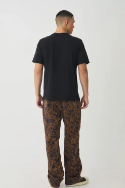 boohooMAN Relaxed Fit Abstract Flock Turn Up Hem Jeans | UK| Jeans