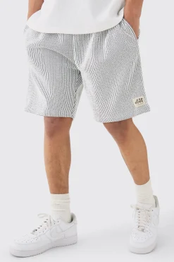 boohooMAN Relaxed Mid Length Textured Short With Woven Tab | UK| Shorts