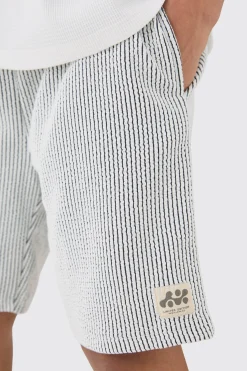 boohooMAN Relaxed Mid Length Textured Short With Woven Tab | UK| Shorts
