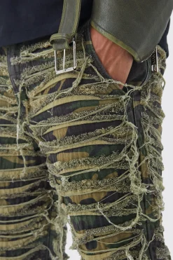 boohooMAN Slim Stacked Flare Heavily Distressed Camo Trouser | UK| Trousers