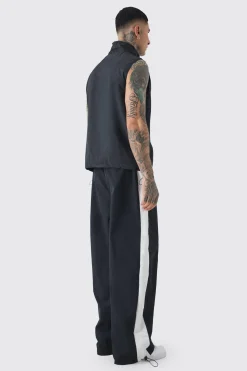 boohooMAN Tall 1/4 Zip Lightweight Adjustable Hem Gilet | UK| Coats & Jackets