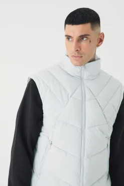 boohooMAN Tall Abstract Quilted Funnel Neck Gilet In | UK| Coats & Jackets