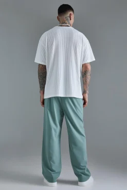 boohooMAN Tall Elasticated Waist Lightweight Technical Stretch Relaxed Trouser | UK| Trousers