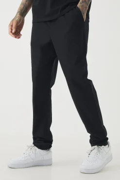 boohooMAN Tall Elasticated Waist Lightweight Technical Stretch Slim Trouser | UK| Trousers