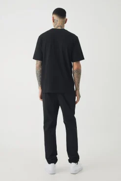 boohooMAN Tall Elasticated Waist Lightweight Technical Stretch Slim Trouser | UK| Trousers