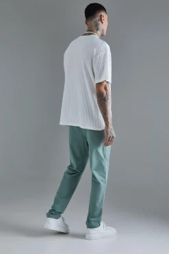 boohooMAN Tall Elasticated Waist Lightweight Technical Stretch Slim Trouser | UK| Trousers