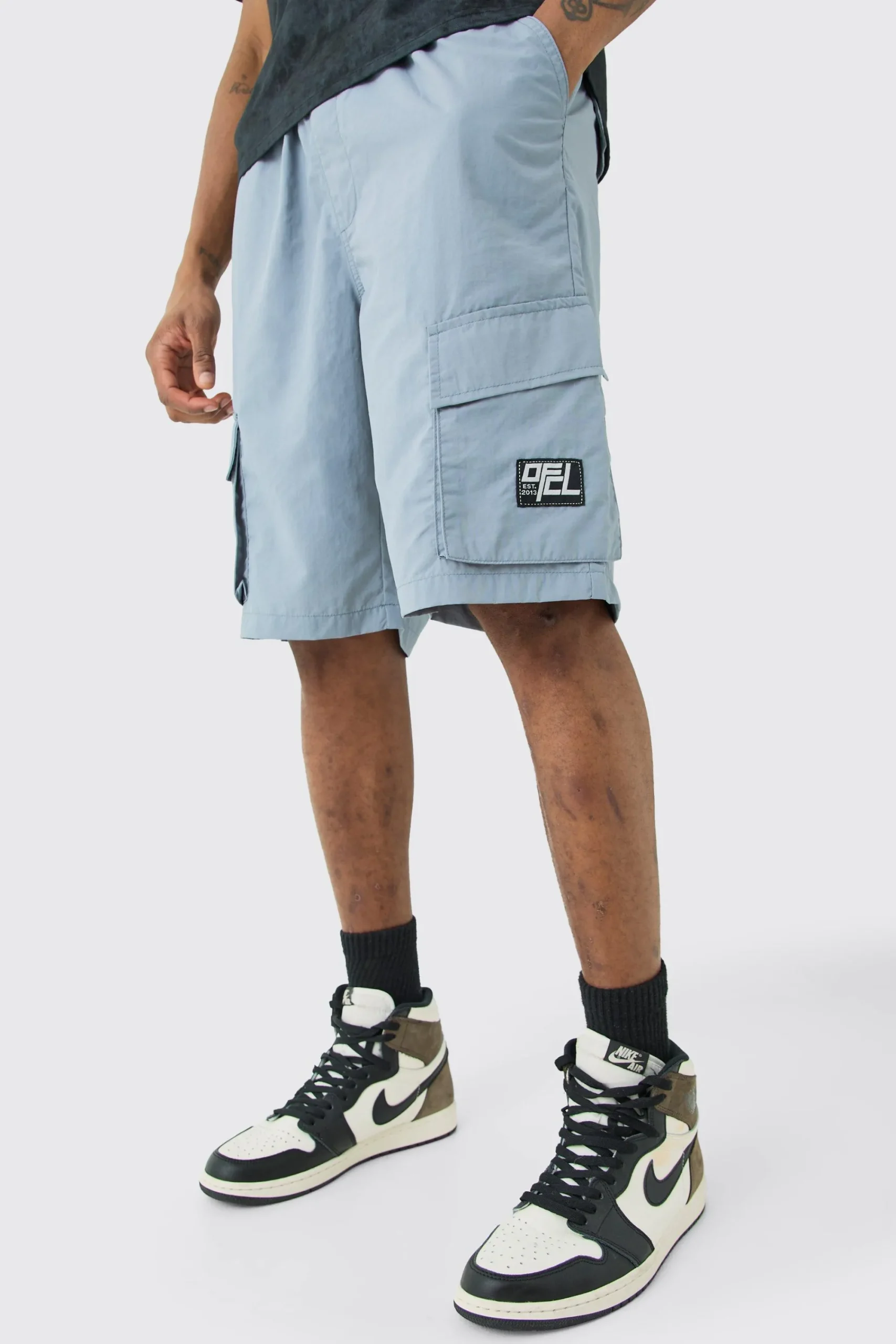 boohooMAN Tall Elasticated Waist Ofcl Nylon Cargo Short | UK| Shorts
