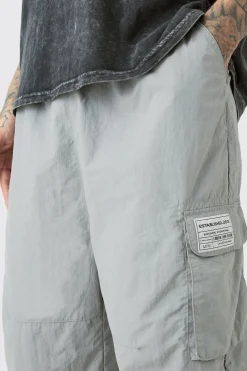 boohooMAN Tall Pleat Knee Branded Parachute Pants | UK| Trousers