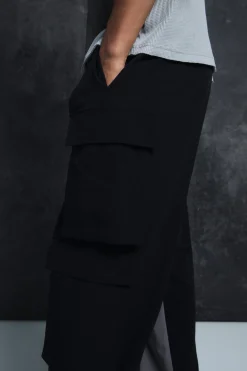 boohooMAN Trippie Redd Elasticated Waist Relaxed Technical Stretch Cargo Trousers | UK| Trousers|Cargos